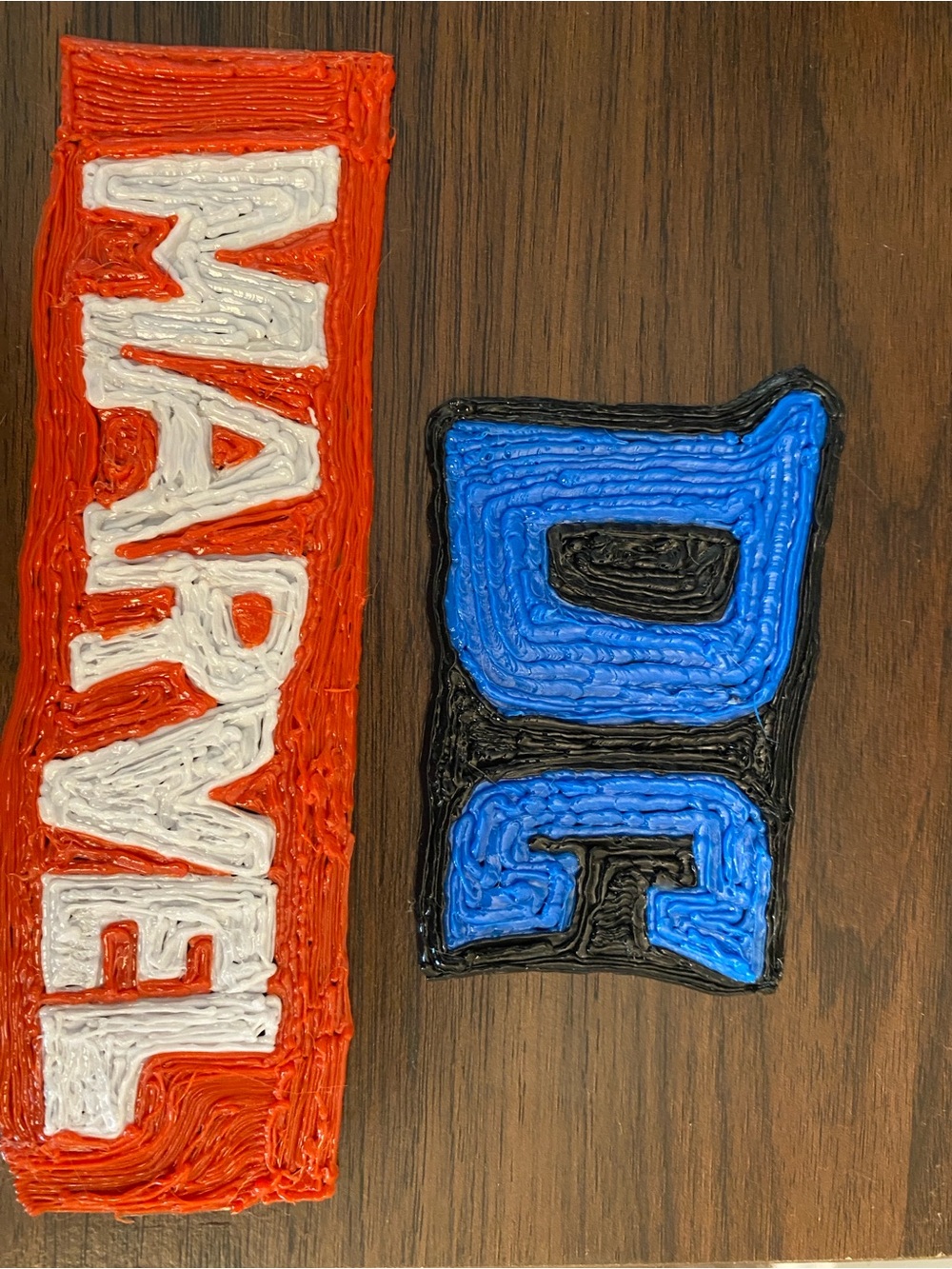 Red and White 'MARVEL' Wall Art Panel with DC games logo Piece